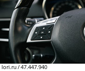 Novosibirsk, Russia -  March  23, 2024: Mercedes-Benz GL-class,  Close up of car steering wheel with function buttons. Стоковое фото, фотограф Виталий Сова / Фотобанк Лори