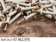 Set of dowels and nails. Dowels for fastening in concrete. Стоковое фото, фотограф Александр Собко / Фотобанк Лори