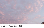 Пейзаж. Закат. Облака, освещенные закатным солнцем. Sunset. Clouds illuminated by the setting sun. Стоковое видео, видеограф Александр Рыбалка / Фотобанк Лори