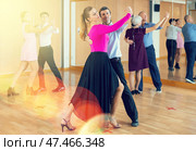 Woman and man dancing slow ballroom dance in choreography studio. Стоковое фото, фотограф Яков Филимонов / Фотобанк Лори