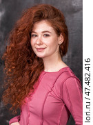 Studio portrait of a red-haired girl. Стоковое фото, фотограф Андрей Аркуша / Фотобанк Лори