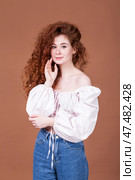 Studio portrait of a red-haired girl. Стоковое фото, фотограф Андрей Аркуша / Фотобанк Лори