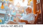 Golden Hour Reverie: An Elderly Man's Peaceful Afternoon with Dominoes. Стоковое AI-изображение, AI-художник Данила Большаков / Фотобанк Лори