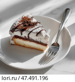 Indulgent slice of cake served with a dessert spoon on a white plate. Кусочек торта, поданный с десертной ложкой на белой тарелке. Стоковое AI-изображение, AI-художник Katsiaryna Repich / Фотобанк Лори