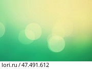 Светящийся зелено-жёлтый боке фон. Стоковое AI-изображение, AI-художник Александр Жуков / Фотобанк Лори