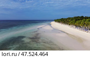 Aerial view of beautiful tropical sandy beach. Стоковое фото, фотограф Михаил Коханчиков / Фотобанк Лори