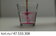 Vibrant Ink Swirl in Water An Artistic Display of Liquid Motion That Captures Imagination. Стоковое видео, видеограф Olesia Kondrateva / Фотобанк Лори