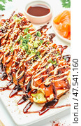 Fusion breakfast plate with japanese flavors and toppings. Стоковое AI-изображение, AI-художник Евгения Пархоменко / Фотобанк Лори