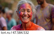 Elder Woman Smiling Joyfully During Holi Festival Celebration With Vibrant Colors and Joyous Atmosphere in Springtime Festivities. Стоковое AI-изображение, AI-художник Sergey Grishin / Фотобанк Лори