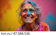 Colorful Celebration of Holi Featuring an Elderly Woman Joyfully Embracing the Vibrant Festival Traditions. Стоковое AI-изображение, AI-художник Sergey Grishin / Фотобанк Лори