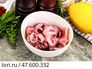 Marinated baby octopus snack appetizer. Стоковое фото, фотограф Андрей Старостин / Фотобанк Лори