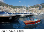 Monaco, Monte-Carlo, 29.05.2008: Port Hercule, View from water, luxury yachts in harbor of Monaco, Etats-Uni, Piscine, Hirondelle, riva boat. Редакционное фото, фотограф Vladimir Drozdin / Фотобанк Лори