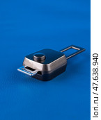 Close up of mobile seat belt extender on blue background. Стоковое фото, фотограф Виталий Сова / Фотобанк Лори