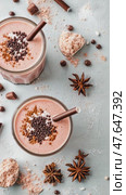 Pink chocolate smoothie with star anise is presented as a sweet, tasty dessert drink with sprinkles. Стоковое AI-видео, аниматор Данила Большаков / Фотобанк Лори