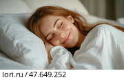 Beautiful young woman peacefully sleeping in cozy bed. Красивая молодая женщина мирно спит в уютной постели. Стоковое AI-изображение, AI-художник Katsiaryna Repich / Фотобанк Лори