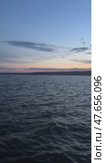 Tranquil ocean sunset progression with rippling waves and colorful sky. Стоковое видео, видеограф Бакина Александра / Фотобанк Лори