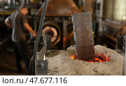 Foundry ferrous metal is melted in an induction furnace of metallurgical plant. Стоковое фото, фотограф Татьяна Яцевич / Фотобанк Лори
