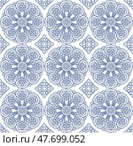 Blue Ornamental Seamless Pattern with Buddhist Wheel of Samsara and Azulejo Tile Motifs. Стоковая иллюстрация, иллюстратор Пискунова Марина / Фотобанк Лори