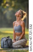 Woman performing neck stretching exercise outdoors. Стоковое AI-видео, аниматор Юрий Поздников / Фотобанк Лори