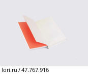 Open book in colour cover with white sheets isolated on a white background. Стоковое фото, фотограф Елена  Попкова / Фотобанк Лори