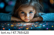A child with bright blue eyes rests her chin on her hands, mesmerized by vibrant cosmic designs illuminating the dark surroundings at night. Стоковое AI-изображение, AI-художник Данила Большаков / Фотобанк Лори