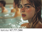 A close-up of a girl with wet hair and water droplets on her skin, standing in a swimming pool. Her gaze is directed at the camera - expressive, thoughtful, a little introverted. The lighting is soft and warm, the reflections of the water create a glittering effect on her face and shoulders. In the background, the figures of other people in the water are blurred, giving the photo an atmosphere of a lively but calm public space. The image conveys moments of relaxation, self-awareness, solitude and purity. Стоковое AI-изображение, AI-художник Анна Кривицкая / Фотобанк Лори