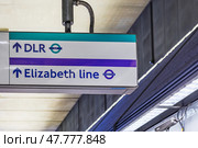 Clear DLR and Elizabeth Line Signage at London Underground Station for Easy Navigation (2024 год). Редакционное фото, фотограф Zydrius Tartenis / Фотобанк Лори