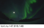 Northern Lights Time lapse 4K video, polar light or Aurora Borealis in the dark winter night sky over the arctic landscape. Стоковое видео, видеограф Николай Евсюков / Фотобанк Лори