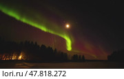 Northern Lights Time lapse 4K video, polar light or Aurora Borealis in the dark winter night sky over the arctic landscape. Стоковое видео, видеограф Николай Евсюков / Фотобанк Лори