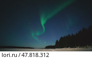 Northern Lights Time lapse 4K video, polar light or Aurora Borealis in the dark winter night sky over the arctic landscape. Стоковое видео, видеограф Николай Евсюков / Фотобанк Лори