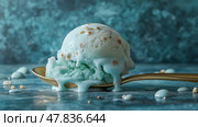 Delicious mint ice cream melting on a golden spoon with decorative sprinkles. Вкусное мятное мороженое, тающее на золотой ложке с декоративной посыпкой. Стоковое AI-изображение, AI-художник Katsiaryna Repich / Фотобанк Лори