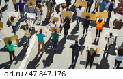 Activists gather in the afternoon, holding signs and marching along a city road, united for social justice and community change. Стоковое AI-изображение, AI-художник Данила Большаков / Фотобанк Лори