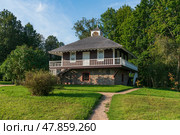 House-Museum of A. P. Hannibal in the Petrovskoye estate of the natural landscape Reserve of A. S. Pushkin on a sunny summer day, Pushkinskie Gory, Pskov region, Russia. Стоковое фото, фотограф Ula Ulachka / Фотобанк Лори