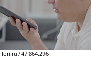 Man using ChatGPT in the mobile phone. This app is a chatbot based on Artificial Intelligence developed by OpenAI. Dubai, UAE: 07.05.2025. High quality. Стоковое видео, видеограф Feruza Tashmetova / Фотобанк Лори