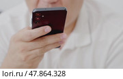 Man using ChatGPT in the mobile phone. This app is a chatbot based on Artificial Intelligence developed by OpenAI. Dubai, UAE: 07.05.2025. High quality. Стоковое видео, видеограф Feruza Tashmetova / Фотобанк Лори