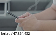 Man using ChatGPT in the mobile phone. This app is a chatbot based on Artificial Intelligence developed by OpenAI. Dubai, UAE: 07.05.2025. High quality. Стоковое видео, видеограф Feruza Tashmetova / Фотобанк Лори
