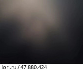 Plumes of smoke drift upwards, enveloping the surrounding area in a soft, ethereal haze at dusk, creating an enchanting and moody environment. Generative AI. Стоковое AI-изображение, AI-художник Юлия Петровская / Фотобанк Лори