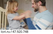 Happy Father Playing with Daughter. Three Years Baby Smiling, Laughing, Looking at Daddy. Man Showing Affection to Child. Candid Real Emotion. Beard Dad and Little Kid Girl. Authentic Family Lifestyle. Стоковое видео, видеограф Марина Демидюк / Фотобанк Лори