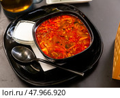 National dish of Russian cuisine is Solyanka soup. Стоковое фото, фотограф Яков Филимонов / Фотобанк Лори