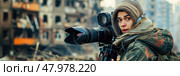 A young photographer focuses intently on capturing the devastation of a war-torn city, shrouded in the early morning light. Стоковое AI-изображение, AI-художник Данила Большаков / Фотобанк Лори