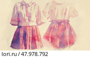 Two beautiful dresses are showcased in a soft, colorful display highlighting their unique styles and fabric textures. Стоковое AI-изображение, AI-художник Данила Большаков / Фотобанк Лори