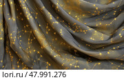 Elegant draped fabric showcasing gold celestial patterns against a soft neutral background for fashion design inspiration. Стоковое AI-изображение, AI-художник Сергей Толмачёв / Фотобанк Лори