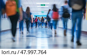 A somewhat blurry hospital corridor filled with numerous people walking about on their various errands and duties. Стоковое AI-изображение, AI-художник Anastasy Yarmolovich / Фотобанк Лори