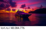 A luxury yacht glides through calm waters as a stunning sunset paints the sky with vivid colors, creating a serene atmosphere in a tropical paradise. Стоковое AI-изображение, AI-художник Данила Большаков / Фотобанк Лори