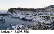 Monaco yacht show exhibiting luxury yachts and boats in port hercule. Стоковое фото, фотограф David Kashakhi / Фотобанк Лори
