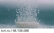 Extreme Close-up effervescent tablet, pill bubbling underwater. Shot on super slow motion camera 1000 fps. Стоковое видео, видеограф Андрей Армягов / Фотобанк Лори
