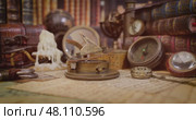 Vintage style travel and adventure. Vintage old compass and other vintage items on the table. Стоковое видео, видеограф Андрей Армягов / Фотобанк Лори
