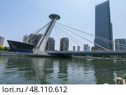 Tianjin, China, bridge in the Haihe river.  Мост на реке Хайхэ в городе Тяньцзинь, Китай (2024 год). Стоковое фото, фотограф Римма Тельнова / Фотобанк Лори