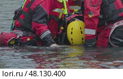 3 may 2025, Lisbon. Portugal - Traininh - Swift water rescue team securing victim onto spineboard. Редакционное видео, видеограф Константин Шишкин / Фотобанк Лори