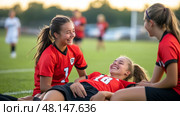 A Joyful Young Soccer Team Celebrating Together Enthusiastically After Their Game Has Concluded Successfully. Стоковое фото, фотограф Anastasy Yarmolovich / Фотобанк Лори